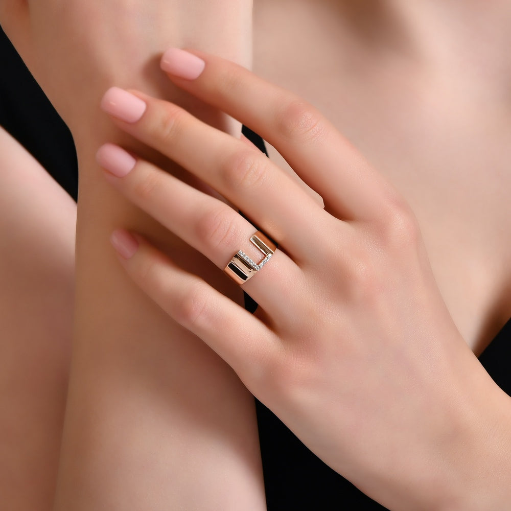0.09 ct. Buchstabe L Diamantring