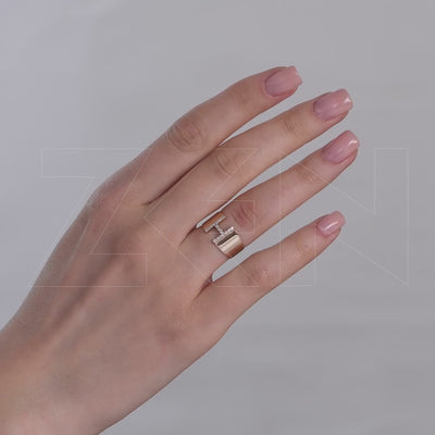 0.14 ct. Letter H Diamond Ring